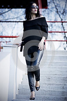 Woman on the stadium wearing black