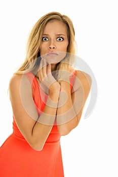 Woman stand in red dress close stressed