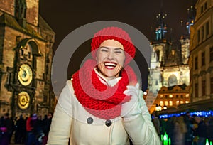 Woman standing at Christmas on Staromestske namesti in Prague photo
