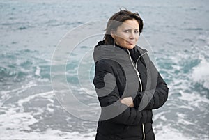 Woman standing front the sea