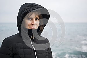 Woman standing front the sea