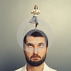 Woman standing on the head of foolish man photo