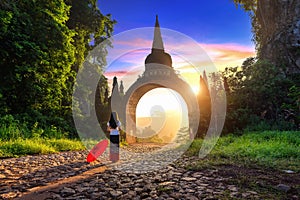 Woman standing at Khao Na Nai Luang Dharma Park in Surat Thani, Thailand.