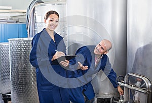 Woman and standing man in fermentation section