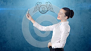 Woman standing near btc logo. Concept of virtual criptocurrency bitcoin dawnfall and correction.