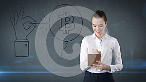Woman standing near btc logo. Concept of virtual criptocurrency bitcoin dawnfall and correction. photo
