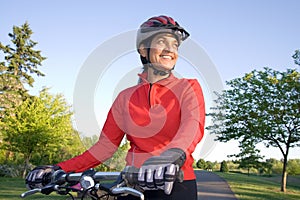Woman Standing Next to Bicycle - Horizontal