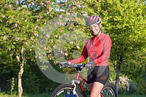 Woman Standing Next to Bicycle - Horizontal