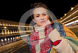 Woman standing at San Marco square in Venice, Italy in winter