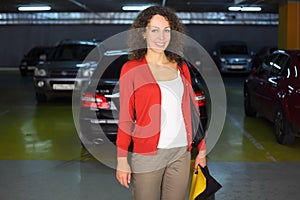 Woman standing in underground car parking