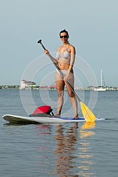 Woman on a Standing Up Paddleboard SUP