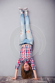 Woman standing upside down