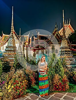 Woman standing in Wat Pho in Thailand, Bangkok