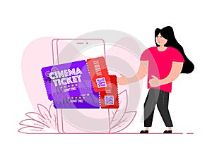A woman stands near the smartphone, on the screen Cinema Movie ticket. Admission pass. Admit One