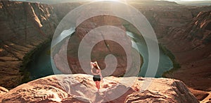 Woman Stands Over the Edge of Horseshoe Bend. Horseshoe Bend, Page, Arizona. Horse Shoe Bend on Colorado River, Grand