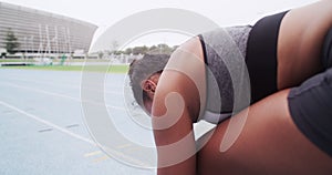 Woman, starting line and running track in sports, race and speed at stadium in Cape Town. Female athlete, runner and