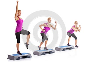 Woman step aerobics exercise