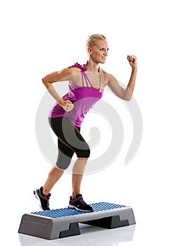 Woman step aerobics exercise photo