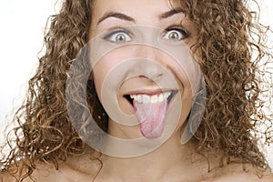 Woman sticking her tongue out photo