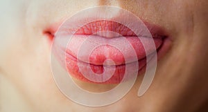 Woman sticking her tongue out