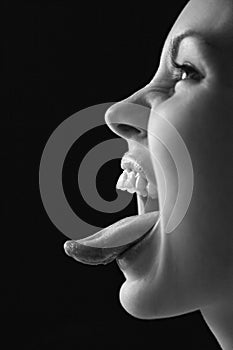 Woman sticking out tongue.