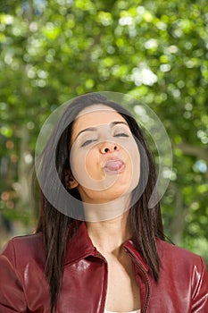 Woman sticking out tongue