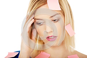 Woman with sticky notes.