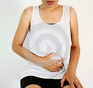 Woman stomach ache because of gastritis