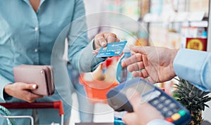 Woman at the store checkout