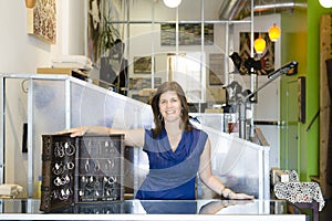 Woman at Store Counter