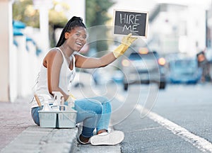Woman, street and poster for looking for job or hiring for cleaning service, work or opportunity in city. Black woman