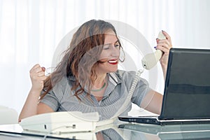 Woman in stress in front of computer