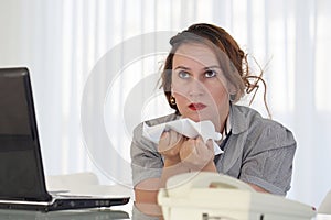 Woman in stress in front of computer