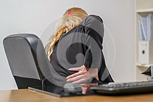 Woman in stress in front of computer