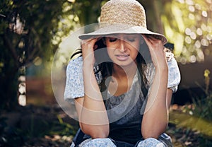 Woman, stress and garden with crying from sad news, depression and memories in home. Female person, outdoor and tears