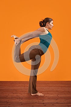 Woman Stretches Her Right Leg