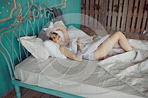 Woman stretching in bed after wake up