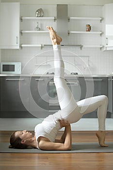 Woman stretching in Bridge exercise