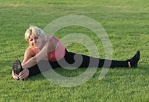 Woman stretching her leg