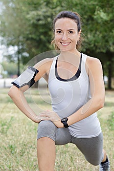 woman stretching leg muscles