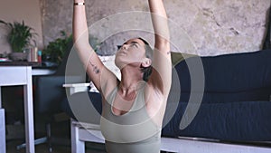 Woman, stretching and meditating on mat, wellness and exercise for health, living room floor and zen. Peaceful, mind and