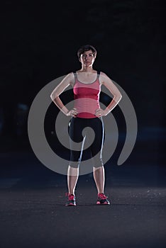 Woman stretching before morning jogging