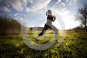 Woman stretching out on the field