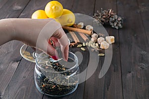 Woman strew herbal tea photo