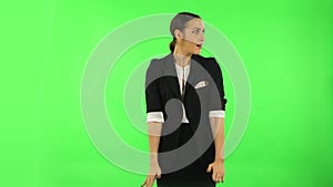 Woman strictly gesturing with hands crossed making X shape meaning denial saying NO. Green screen