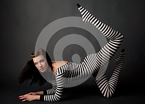 Woman in Striped Bodysuit