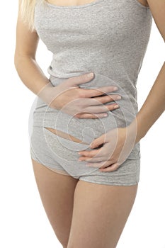 Woman stroking her belly