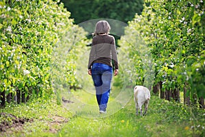 Woman strolling with her dog