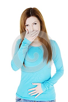 Woman with strong pain of stomach and nausea photo