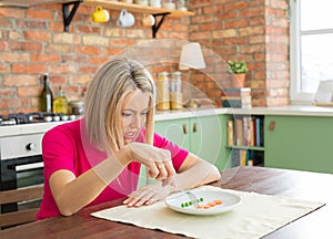 Woman struggling with her diet